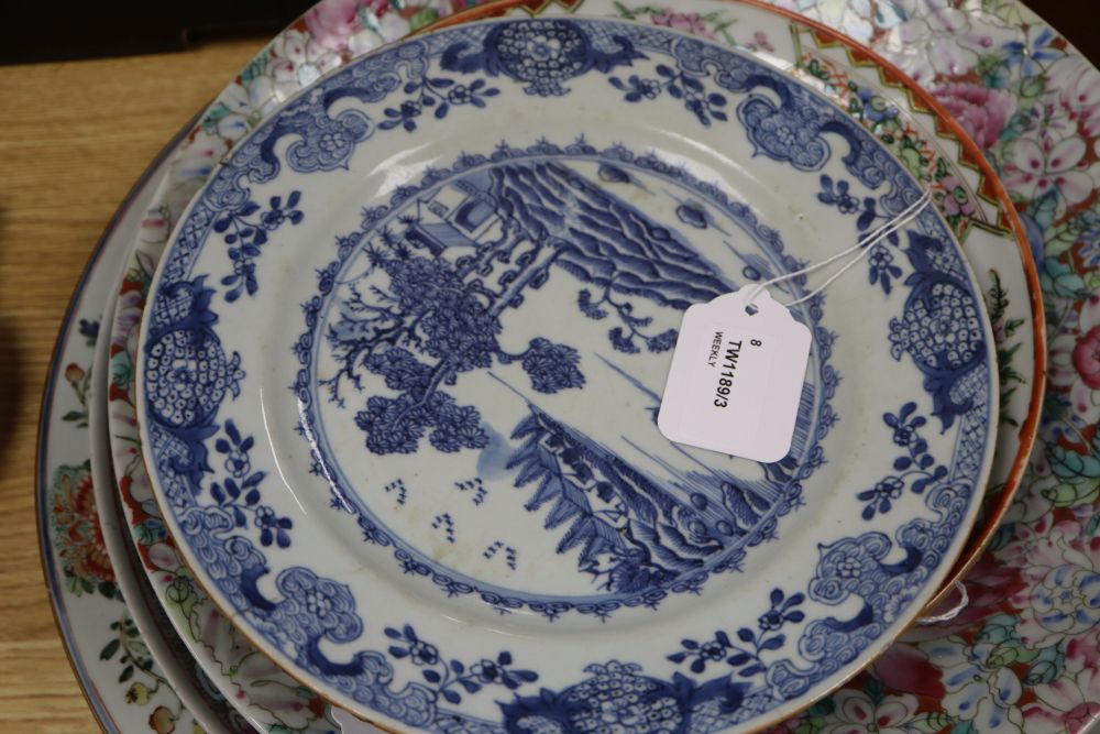 A collection of Oriental chargers and plates,